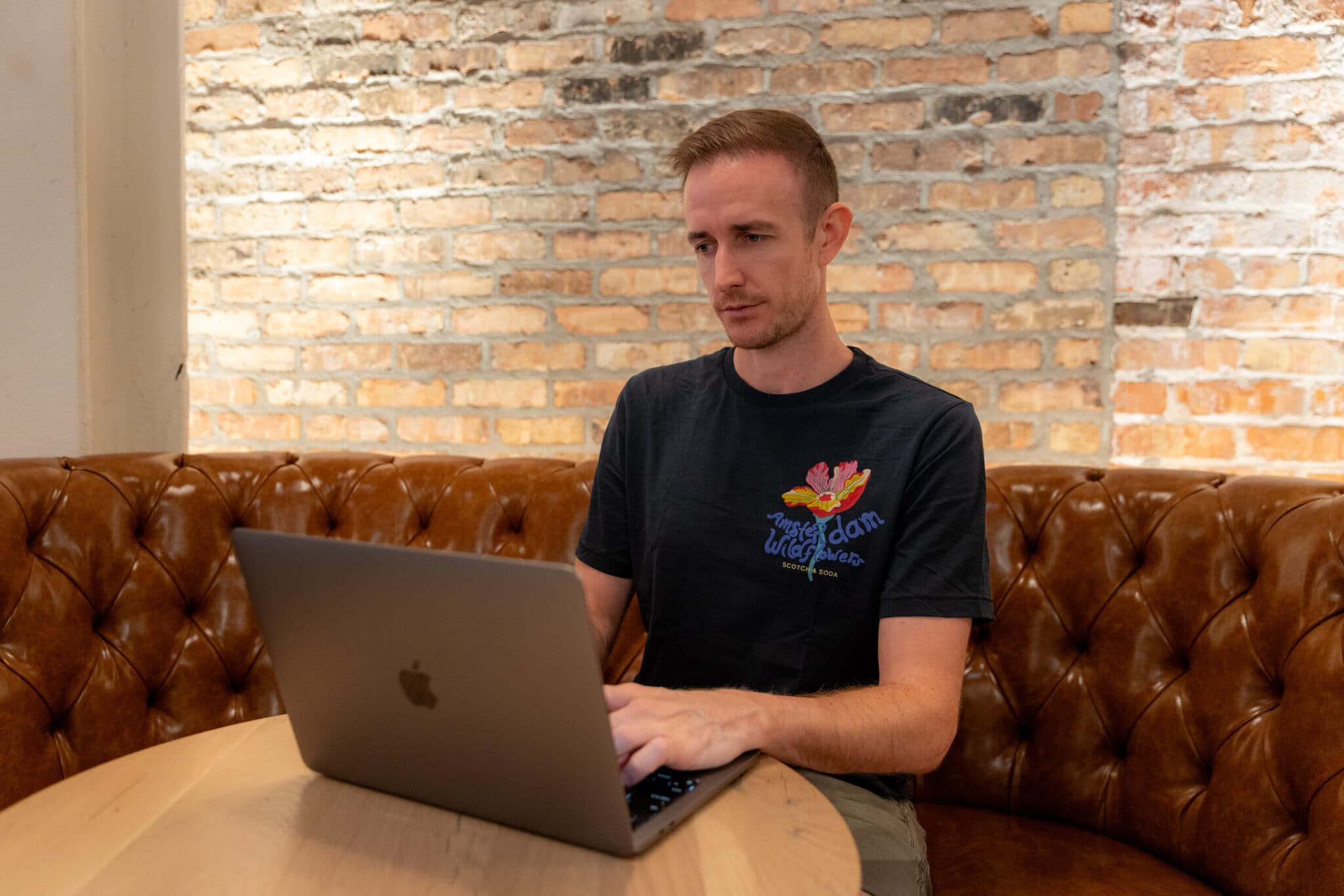 Blogger Ryan Robinson working on his laptop